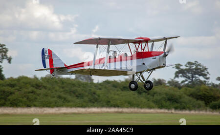 de-Haviland Tiger Moth DH82a G-ANKT taking off Stock Photo