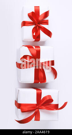 Close up of creative tower composition of Christmas gift boxes Stock Photo
