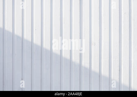 Stripped white concrete wall surface as urban background Stock Photo