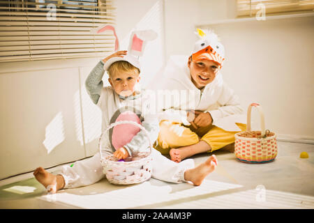 Two brothers dressed up for Easter with their Easter baskets Stock Photo