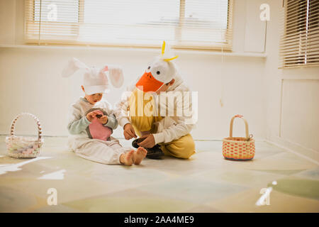 Two brothers dressed up for Easter with their Easter baskets Stock Photo