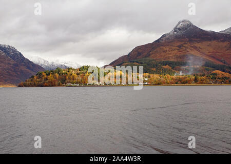 Loch Leven facing towards Invercoe Village and the Snow Topped Pap of Glencoe with the Loch in the foreground Stock Photo