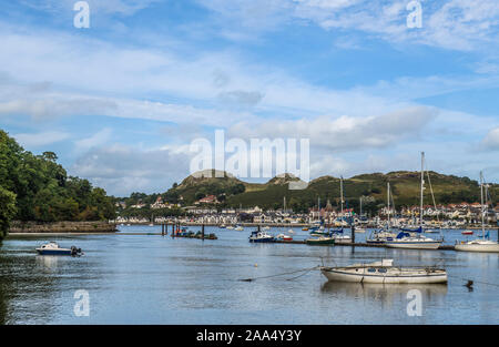 Boats moored on the River Conwy between Conwy and Deganwy in North Wales on a sunny September afternoon in North Wales Stock Photo