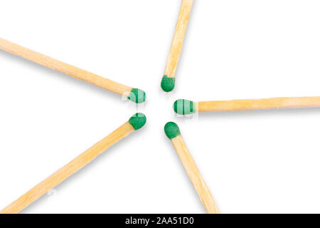 Wooden matches laid out in the shape of a star on white background. Stock Photo