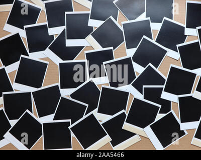 Set of retro photo frames Many polaroid on a cardboard background Vintage Pictures . Top view. Flat lay Stock Photo