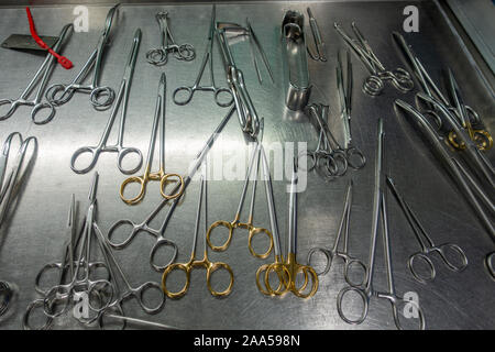 on a metal table there are various washed instruments for performing an operation Stock Photo