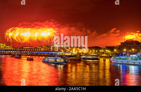 May 9, 2019 View of the festive fireworks over the Moscow River in honor of Victory Day in Moscow. Stock Photo