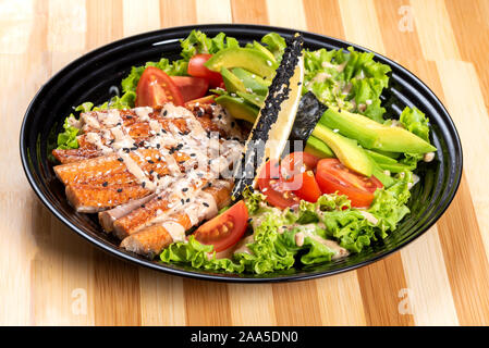 Salmon grilled salad, with herbs and lemon. Stock Photo
