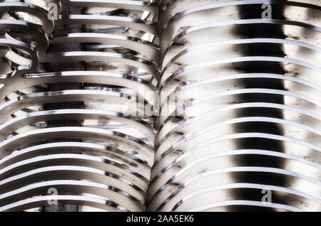 abstract background smooth curved lines metal construction close up Stock Photo