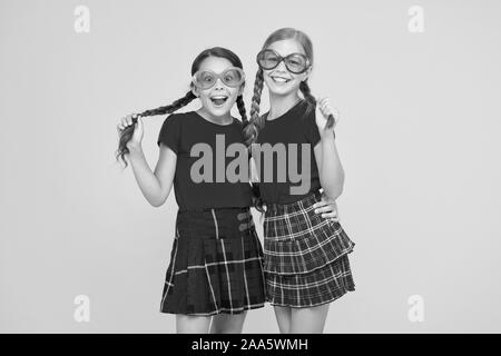 Best friends. Modern fashion. Kids fashion. Little girls wearing rainbow  clothes. Happiness. Girls long hair. Cute children same outfits  communicating. Trendy and fancy. Emotional kids. Fashion shop Stock Photo -  Alamy