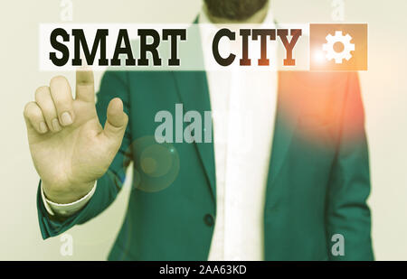Handwriting text Smart City. Conceptual photo urban area that uses different electronic Internet of things Businessman in blue suite and white shirt p Stock Photo