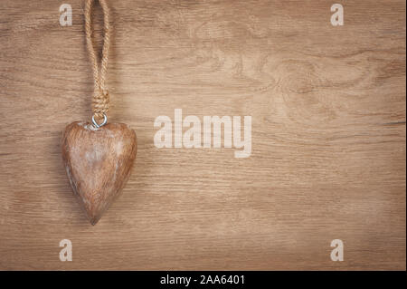 Giving Tuesday, global day of charitable giving. Give help, donate to charities. Wooden heart, flat lay on wood with copy-space. Givingtuesday is a gl Stock Photo