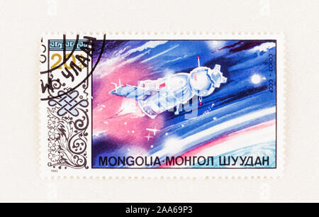 SEATTLE WASHINGTON - October 5, 2019: Mongolia postage stamp commemorating co-operative communist space travel and exploration. Stock Photo