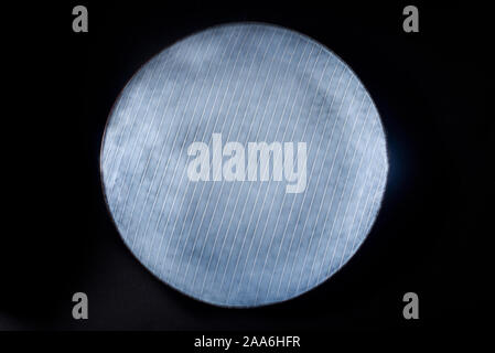 a dark blue ceramic plate with parallel stripes Stock Photo