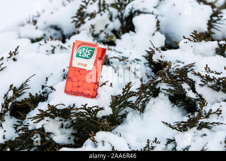 TIC TAC Spearmint/Orange mix used to refresh the mouth, cooling breath and gives off a pleasing smell . TicTac brand of small, hard mints, by Ferrero Stock Photo
