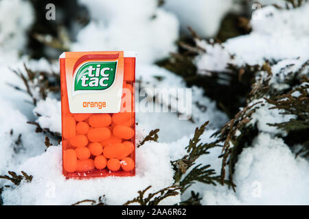 TIC TAC Spearmint/Orange mix used to refresh the mouth, cooling breath and gives off a pleasing smell . TicTac brand of small, hard mints, by Ferrero Stock Photo