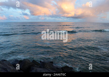 Soft blue ocean wave on clean sandy beach ,Blue ocean wave on sandy beach,sunset and beach - Image Stock Photo