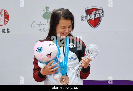 Putian, China's Fujian Province. 20th Nov, 2019. Monika Karsch of Germany poses during the awarding ceremony after the women's 25m pistol final at the ISSF World Cup Final in Putian, southeast China's Fujian Province, Nov. 20, 2019. Credit: Lin Shanchuan/Xinhua/Alamy Live News Stock Photo