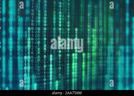power of big data. binary code information bit on computer monitor screen display. Led light text number one and zero. blur defocus blue white bokeh l Stock Photo