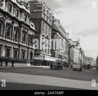 1960s, historical, a view down Piccadilly towards Piccadilly Circus showing a billboard for Austin Cars, London, England, UK. Stock Photo