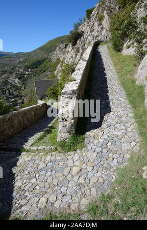 Fortified Path or Zigzagging Walled Footpath leading from Entrevaux Village to the Citadel Alpes-de-Haute-Provence Provence France Stock Photo