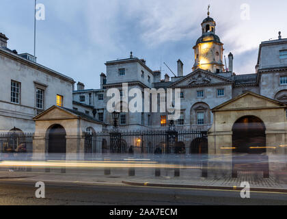 London, England, UK - October 18, 2019: Traffic passes the Georgian palladian Horse Guards building, home of the Household Cavalry, on Whitehall in ce