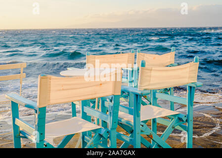 Restaurant near the sea at Little Venice on the island of Mykonos in Greece at sunset Stock Photo