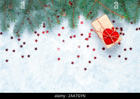 Small Handmade gift boxes in shiny blue night Stock Photo