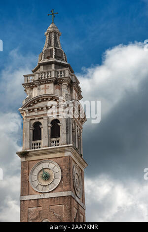 Venice, the bell tower of the Church of Santa Maria Formosa, 1492, on blue sky with clouds. UNESCO world heritage site, Veneto, Italy, Europe Stock Photo