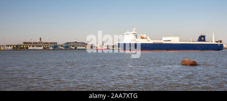 Gravesend, England, UK - September 21, 2010: A roll on-roll off cargo ferry sails the London International Cruise Terminal on the Thames Estuary at Ti Stock Photo