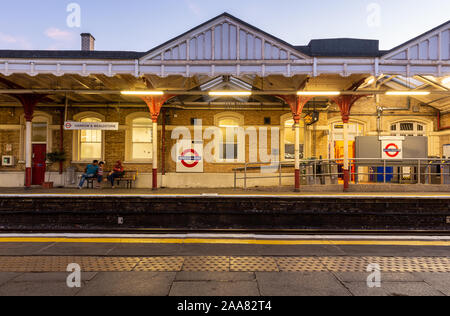 London, England, UK - September 14, 2019: Passengers wait on the platforms at Harrow & Wealdstone Station on the Baterloo and London Overground lines Stock Photo