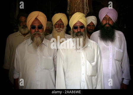 Bikaner, Rajasthan, India: portrait of a group of Indian Sikh men visiting Junagarh Fort Stock Photo