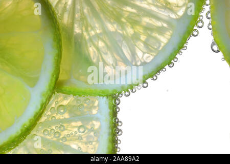 Lemon Slices In Water With Air Bubbles Stock Photo