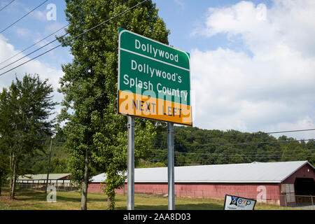 next left sign for dollywood and dollywoods splash country pigeon forge tennessee usa Stock Photo