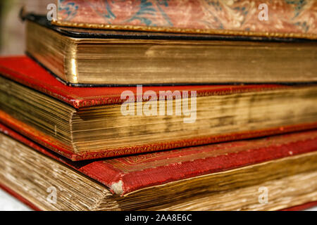 vintage books with special golden coating on pages Stock Photo