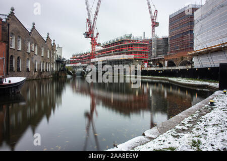 London, England, UK - December 10, 2017: New apartment buildings are under construction along the Regent's Canal in Camden Town, North London. Stock Photo