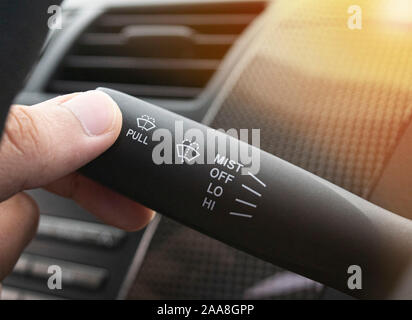 Hand adjusted Car Rain Windscreen Wiper Control Stick. Adjustable wiper blade Remove dirt from the windshield. Stock Photo