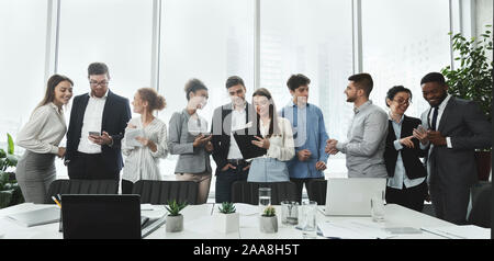 Successful business team talking in conference room Stock Photo