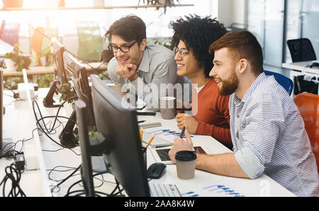 Male team of program engineers working at office Stock Photo