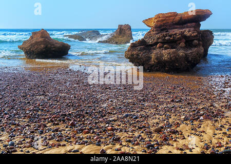 Rocks in the sea at Legzira Beach, Atlantic Ocean, Morocco. Stock Photo