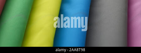 Stacks of colorful clothes Stock Photo