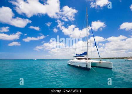 Luxury yacht anchored on turquoise water of Caribbean Sea, Dominican Republic Stock Photo