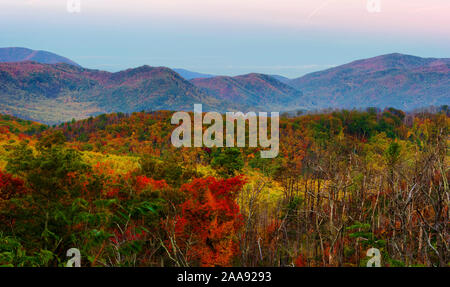 Roaring Fork Motor Trail located in the Smoky Mountains is five miles long single lane road.  Cabins, Creeks, and vast landscapes filled with autumn Stock Photo