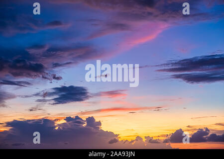 Beautiful evening sky with clouds, sunset, abstract blurred background. Stock Photo