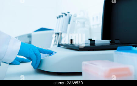 Woman using Medical equipment for scientific researches Stock Photo