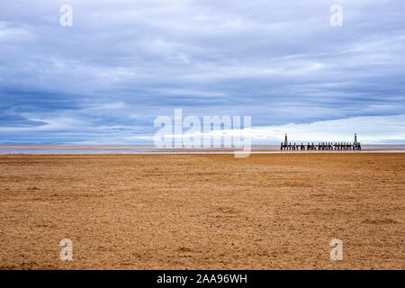 The remains of the old wooden pier in Lytham St Annes Lancashire UK Stock Photo