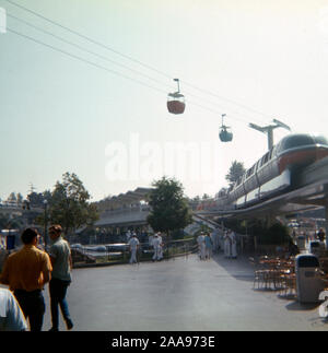 Vintage September 1972 photograph, monorail station with Skyliner aerial tram at Disneyland theme park in Anaheim, California. SOURCE: ORIGINAL 35mm TRANSPARENCY Stock Photo