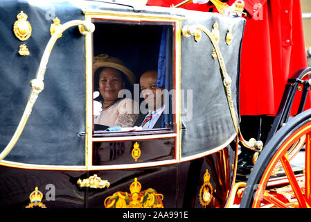 London, UK. 20th Nov, 2019. Ambassador of Suriname Reggy Martiales Nelson and his wife Haidy Nelson-Gravenberch, enjoy a couch ride around Westminster on their way to a private audience with the Queen at Buckingham Palace Credit: PjrFoto/Alamy Live News Stock Photo