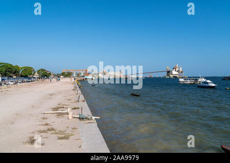 Sidewalk on the river bank of the city of Santarem, Para, Brazil and Rio Tapajos on sunny summer day in the amazon with blue sky. Concept of nature. Stock Photo