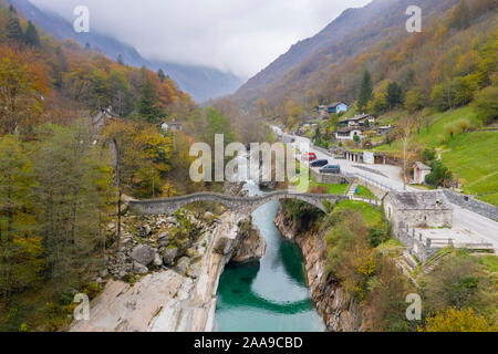 Aerial view of the 'Ponte dei Salti', river Verzasca and the town of Lavertezzo, Valle Verzasca, Canton Ticino, Switzerland. Stock Photo